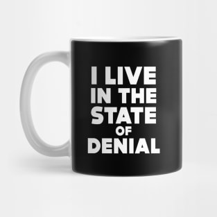 I Live in the State of Denial on a Dark Background Mug